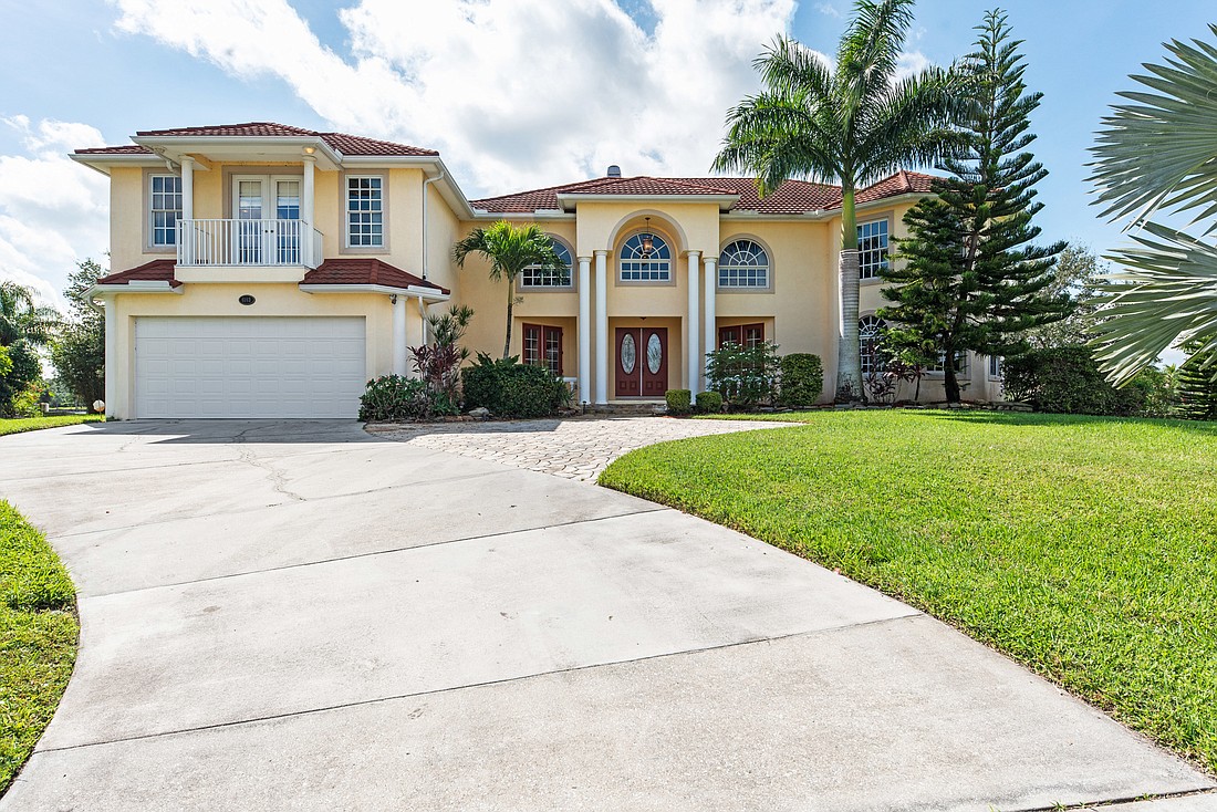 This homeÂ in Cypress Creek Estates sold for $860,000. It has four bedrooms, three baths, a pool and 3,771 square feet of living area. Photo courtesy of listing agentÂ Lisa Morreale.