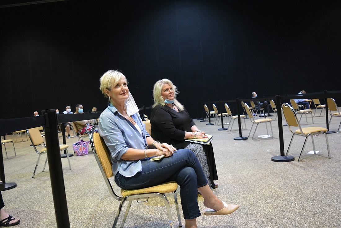 The Concession residents Alicia Peetril (front) and Pamela Donahue (behind) opposed the changes because of concerns related to flooding, as well as connections to Concession&#39;s private water and sewer lines.