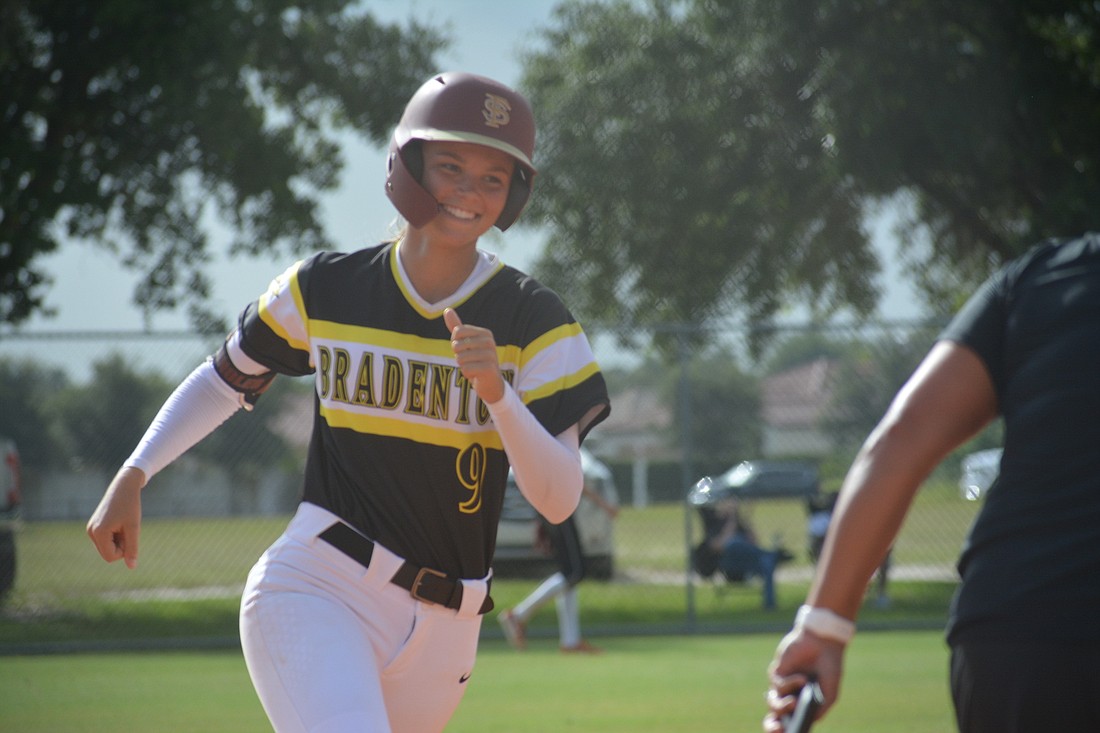 Bradenton Lynx shortstop Devyn Flaherty, a Riverview grad, smiles while completing a home run trot.