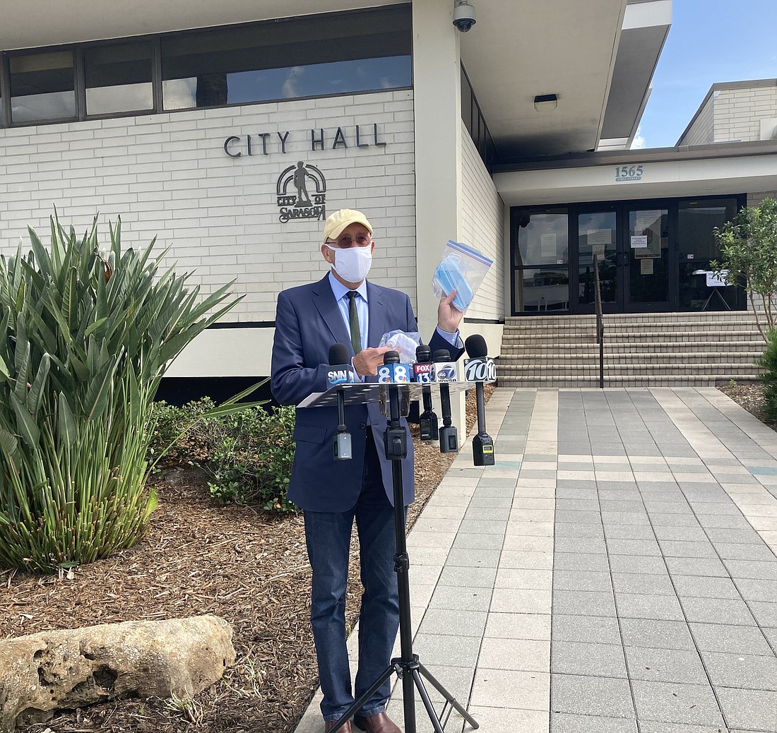 City Manager Tom Barwin speaks at a press conference to discuss new COVID-19 regulations and the city&#39;s plans to give out 50,000 masks to the public. Residents can get masks at City Hall from 10 a.m. to 4 p.m. Thursday, July 2.