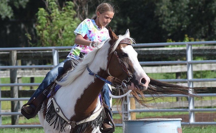 Sarasota's Riley Mills, 12, makes a quick change of direction.