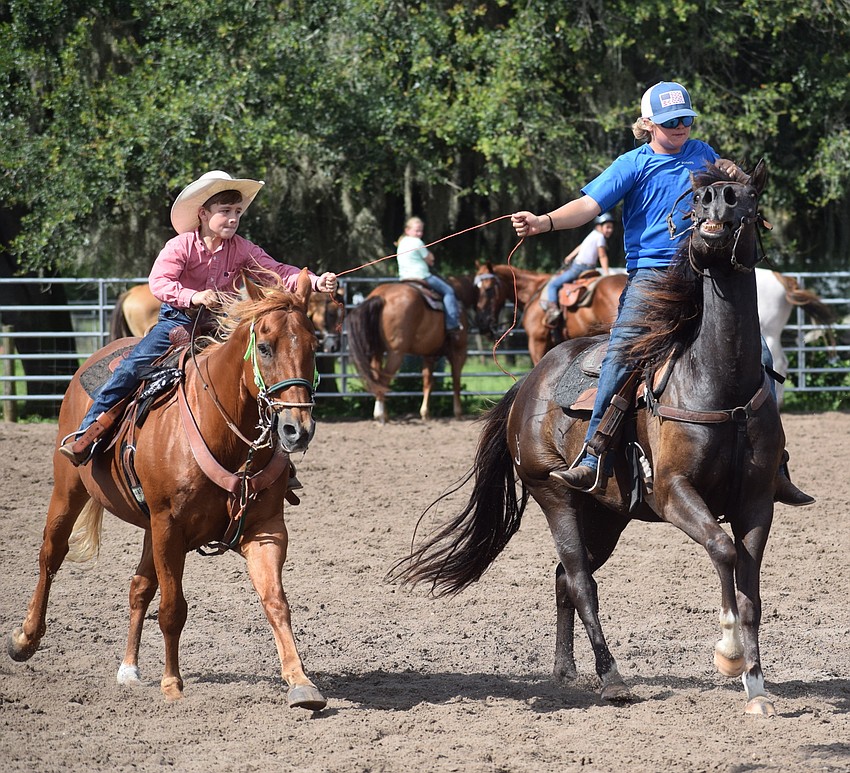 Ridgeton Boyette 8, and Chase Douglas, 14, were teammates in the string race.