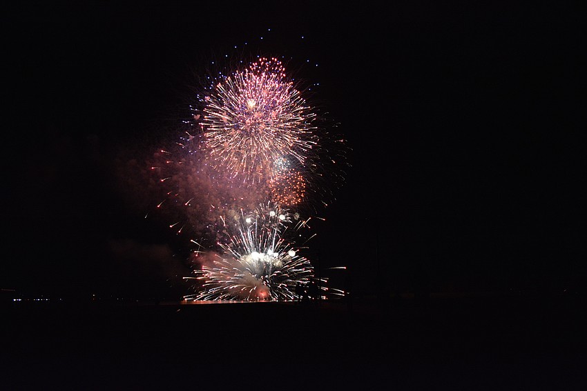The fireworks display included fireworks forming the shapes of hearts and Mickey Mouse ears before the grand finale.
