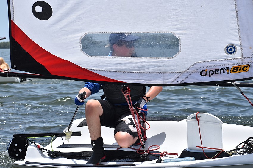 Luca Moschini through the sail.