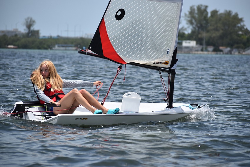 Katherine Armstrong adjusts her sail.
