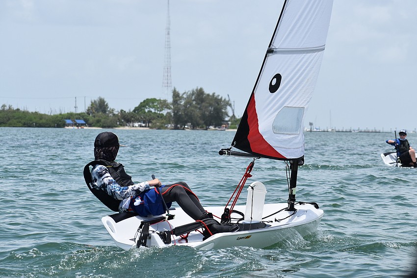 Nils Wheeler navigates his open skiff.