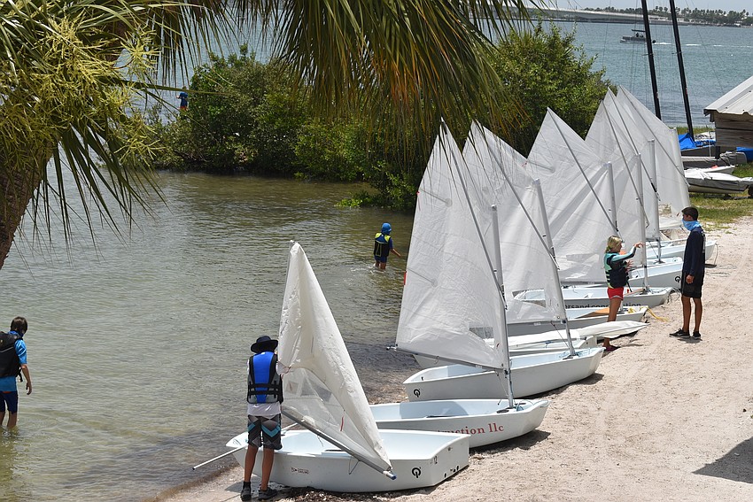 Campers line up their personal boats to take to the water.