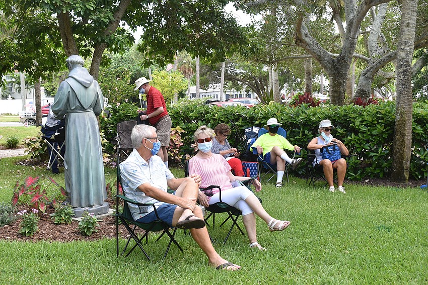 Couples sat together and far from their neighbors.