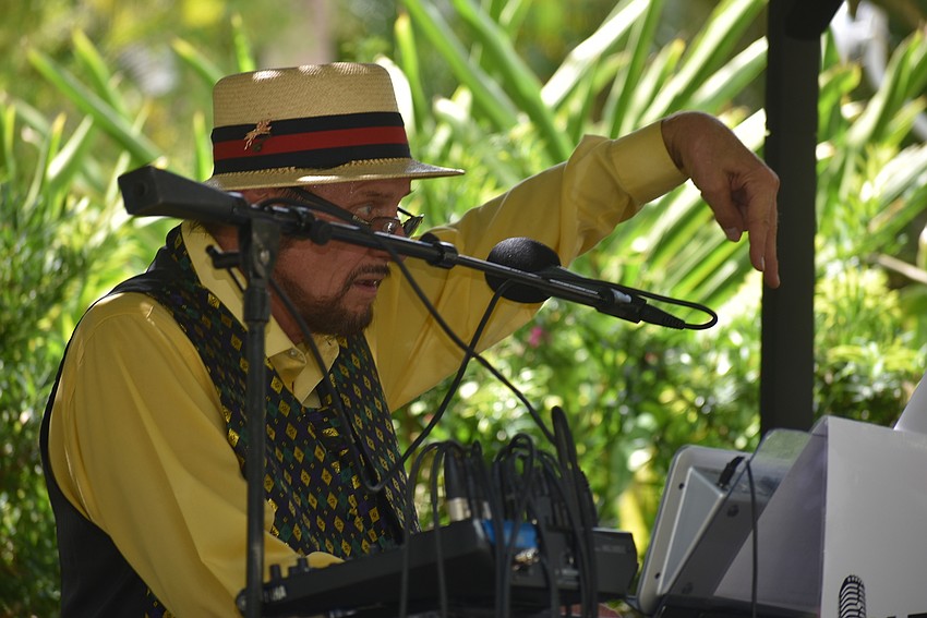 Eric Enfield signals to his bandmates