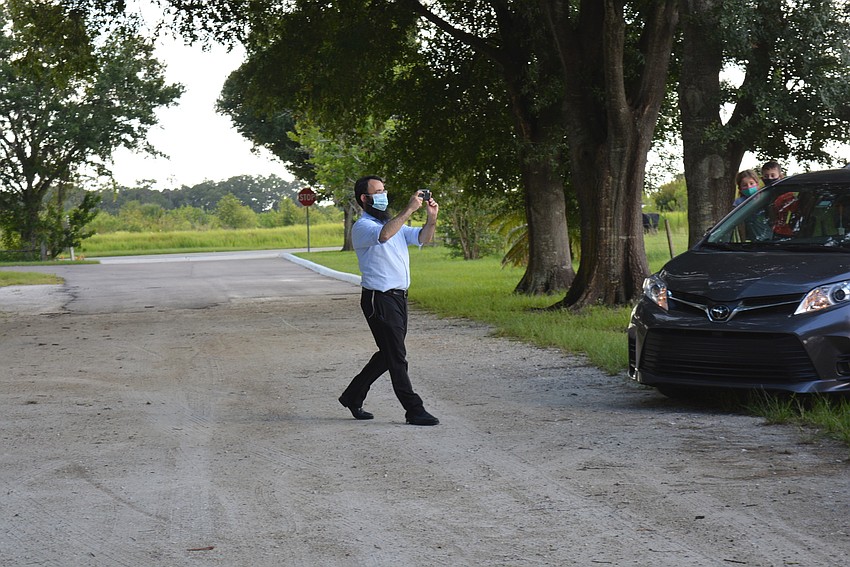 Rabbi Mendy Bukiet does a Facebook Live stream for those who stayed home for the day.