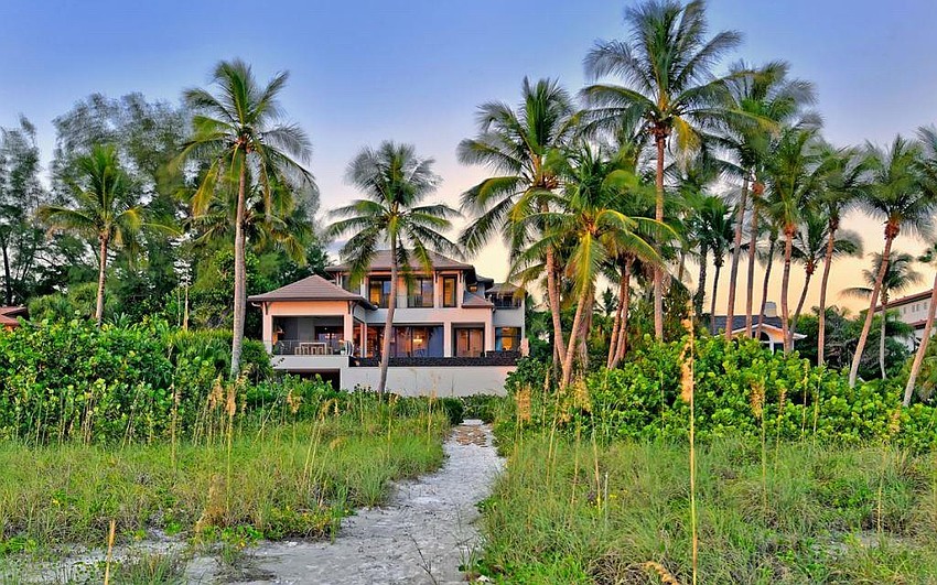 The property is a little more than an acre of beachfront land.