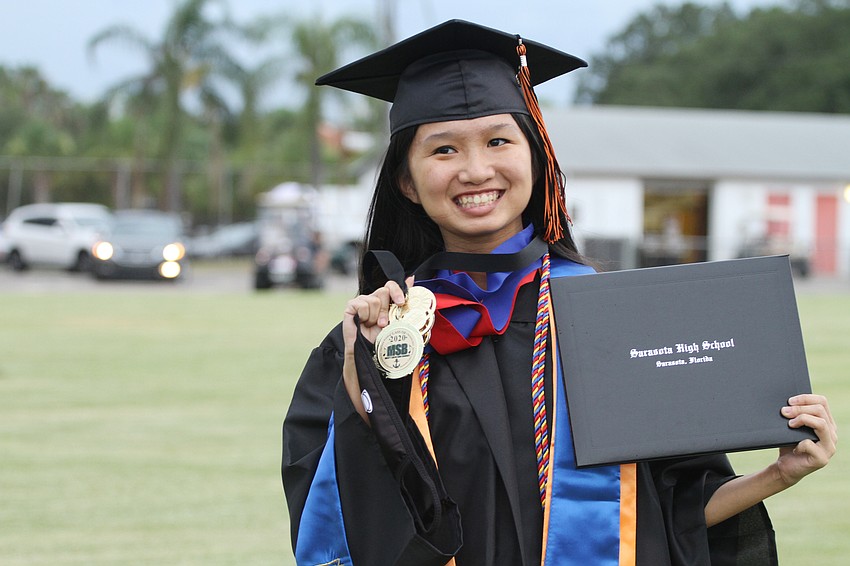 Jordan Febish held up her medal with pride.