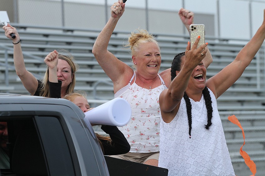 Tracy Custalow and Heather Elliott cheered on Gabriel Elliott
