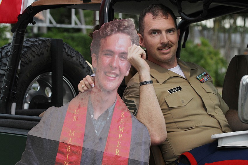 Nick Roberts brought along a cutout of graduate Sage Braune.