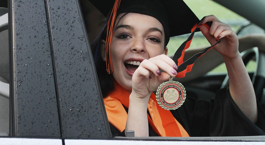Samantha Baker was all smiles receiving her award.