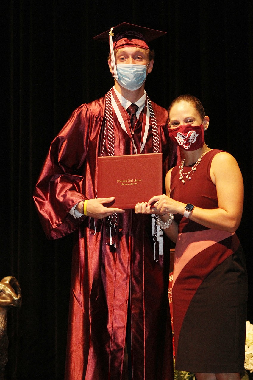 Ian Frost accepted his degree.