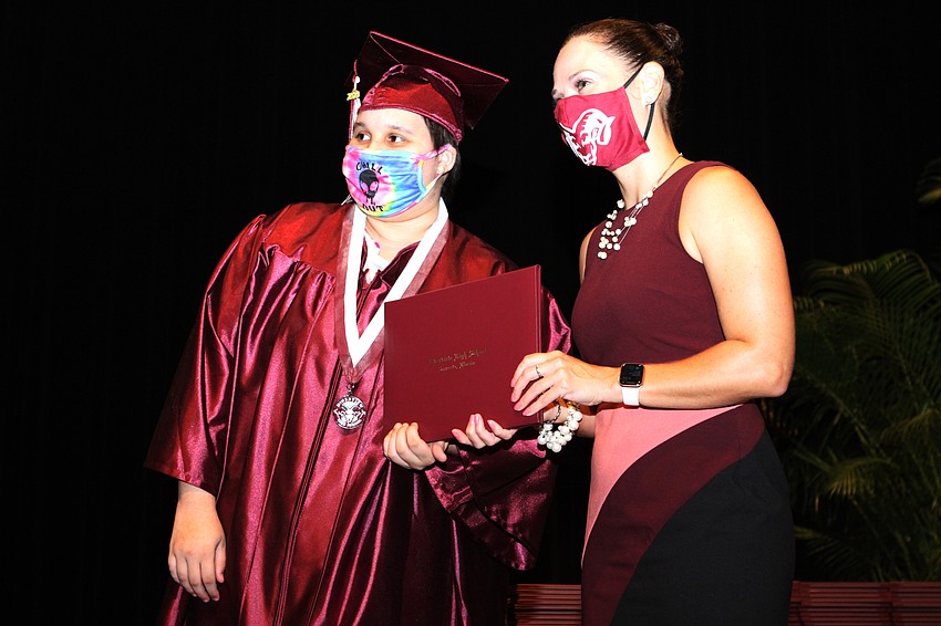 Nadja Alvarado accepted her diploma.