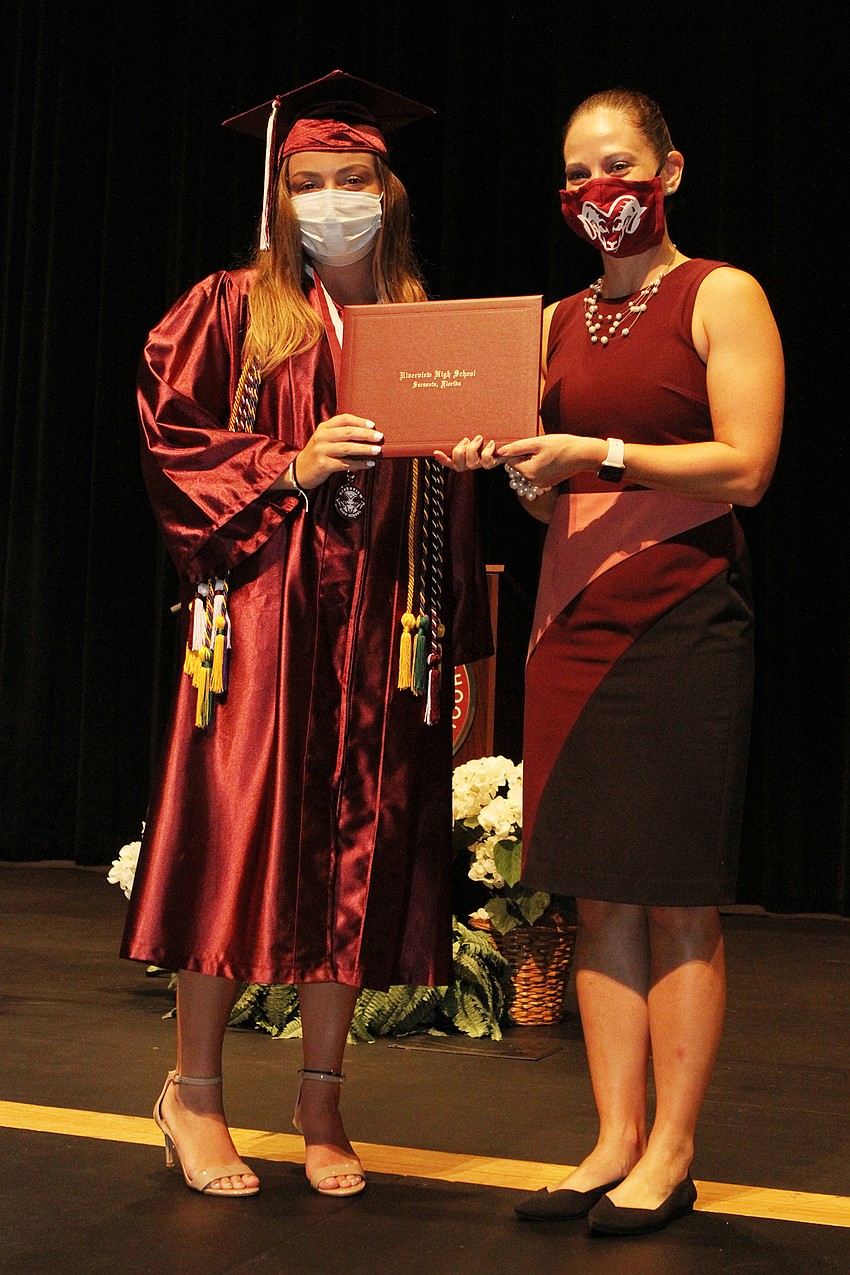 Madison Canterbury accepted her diploma.