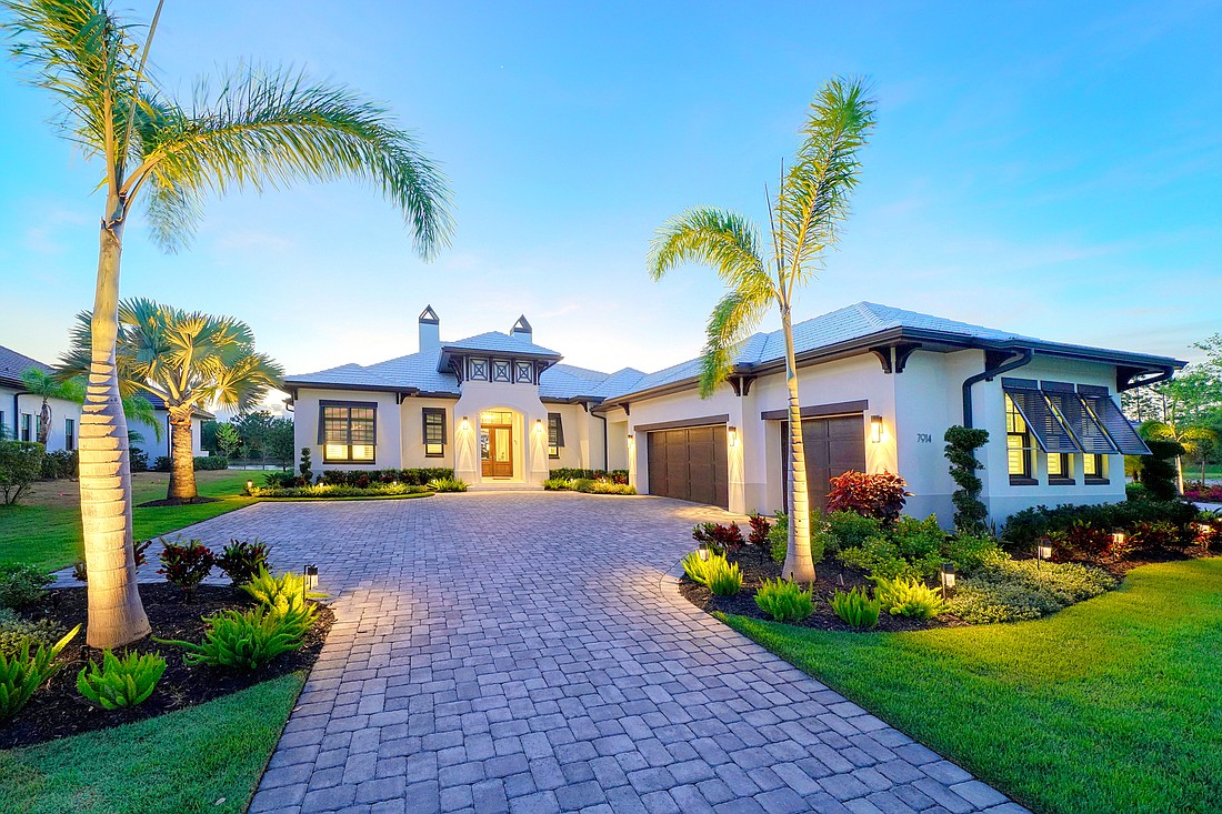 This Lake Club home at 7914 Staysail Court sold for $1.495 million. It has has four bedrooms, four-and-a-half baths, a pool and 3,415 square feet of living area. Photo provided by listing agents Katina and Kenneth Shanahan.