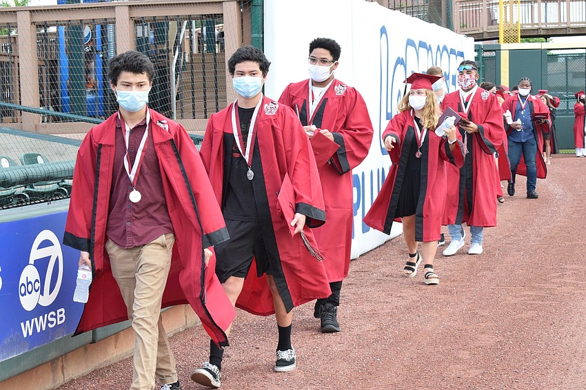 Graduates line up for the ceremony.