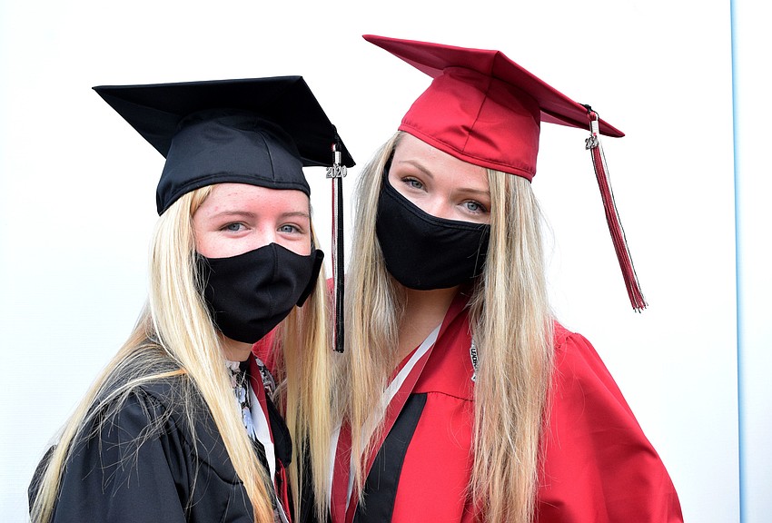 Amber Norland and Sophia Nole are excited to get their diplomas.