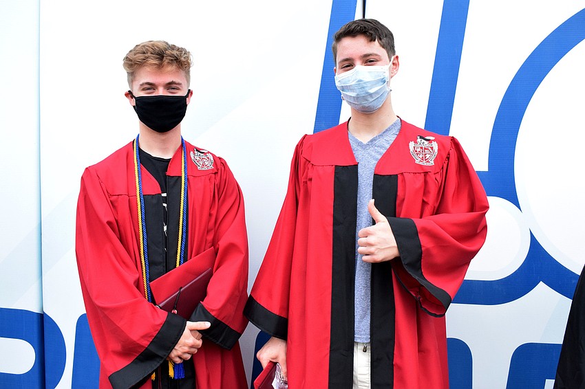 Devin Nichols and Carter Nichols feel great about finally graduating from Braden River High School.