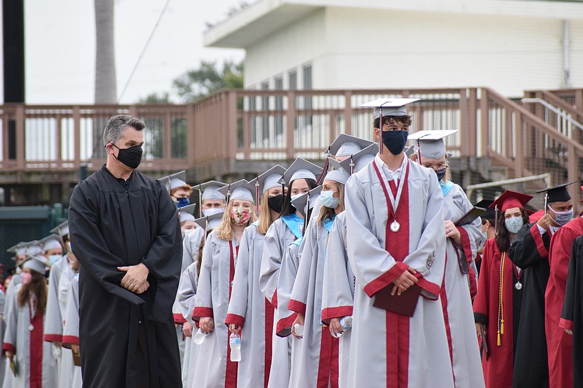 Graduates line up in preparation to receive their diplomas.