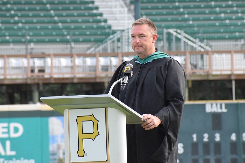 Dustin Dahlquist, principal of Lakewood Ranch High School, welcomes graduates and their families to the school's graduation ceremony at LECOM Park.