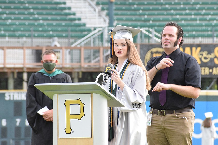 Lily Potter shares a poem during her graduation speech.
