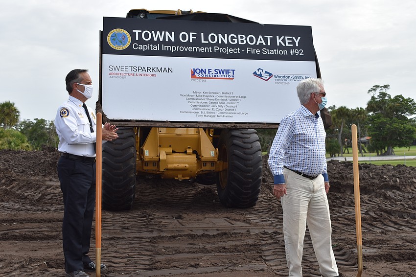 Longboat Key Fire Chief Paul Dezzi stands next to former Mayor Jim Brown during Wednesday's groundbreaking ceremony.