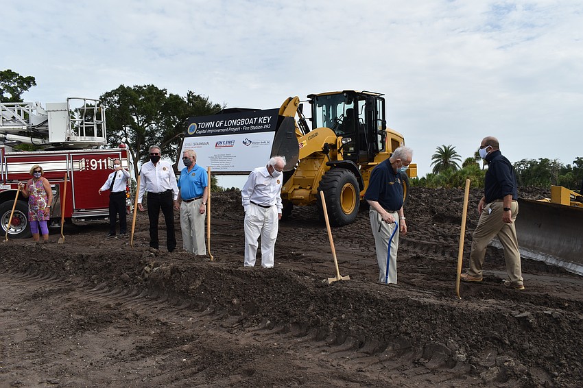 (From left to right) Commissioner BJ Bishop, Fire Chief Paul Dezzi, Vice Mayor Mike Haycock, Mayor Ken Schneier, Commissioner Ed Zunz, Commissioner George Spoll and Town Manager Tom Harmer are pictured.