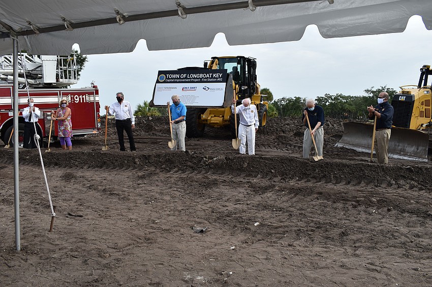 (From left to right) Commissioner BJ Bishop, Fire Chief Paul Dezzi, Vice Mayor Mike Haycock, Mayor Ken Schneier, Commissioner Ed Zunz, Commissioner George Spoll and Town Manager Tom Harmer are pictured.