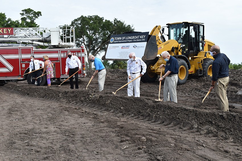 (From left to right) Commissioner BJ Bishop, Fire Chief Paul Dezzi, Vice Mayor Mike Haycock, Mayor Ken Schneier, Commissioner Ed Zunz, Commissioner George Spoll and Town Manager Tom Harmer are pictured.