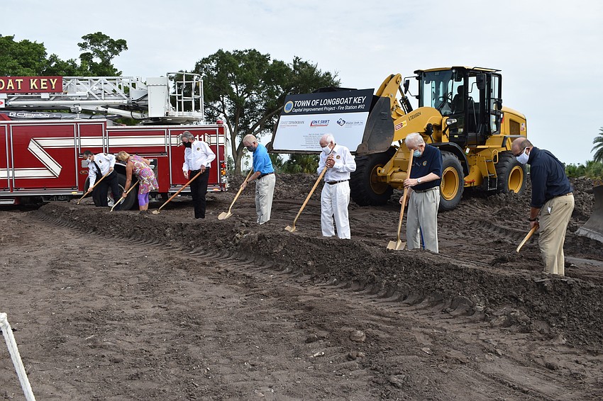 (From left to right) Commissioner BJ Bishop, Fire Chief Paul Dezzi, Vice Mayor Mike Haycock, Mayor Ken Schneier, Commissioner Ed Zunz, Commissioner George Spoll and Town Manager Tom Harmer are pictured.