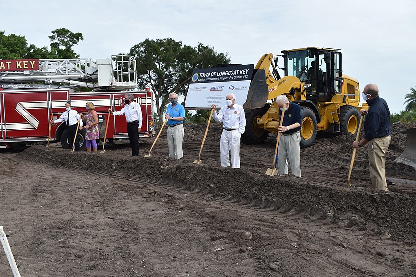 (From left to right) Commissioner BJ Bishop, Fire Chief Paul Dezzi, Vice Mayor Mike Haycock, Mayor Ken Schneier, Commissioner Ed Zunz, Commissioner George Spoll and Town Manager Tom Harmer are pictured.