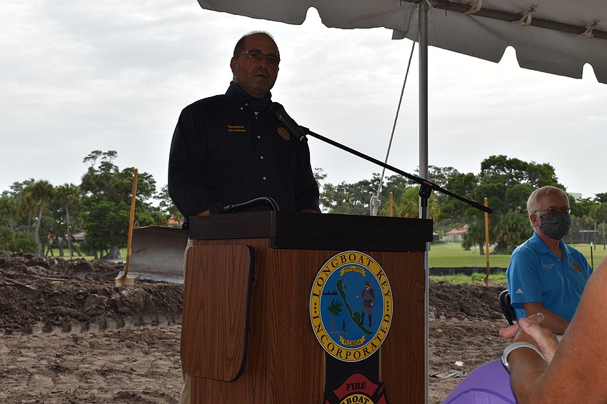 Town Manager Tom Harmer (left) speaks alongside of Mayor Ken Schneier (right) during Wednesday's groundbreaking cerermony.