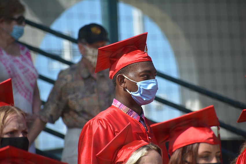 Cardinal Mooney's Meko Mayes listens to the Prayer of the Faithful given by Molly Donaghy.