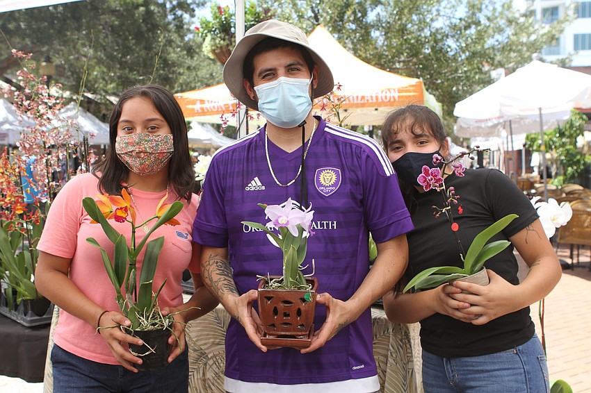 Andrea Espino, Dany Gonzalez and Yvette Marroquin sold plants and flowers at All Around Orchids.