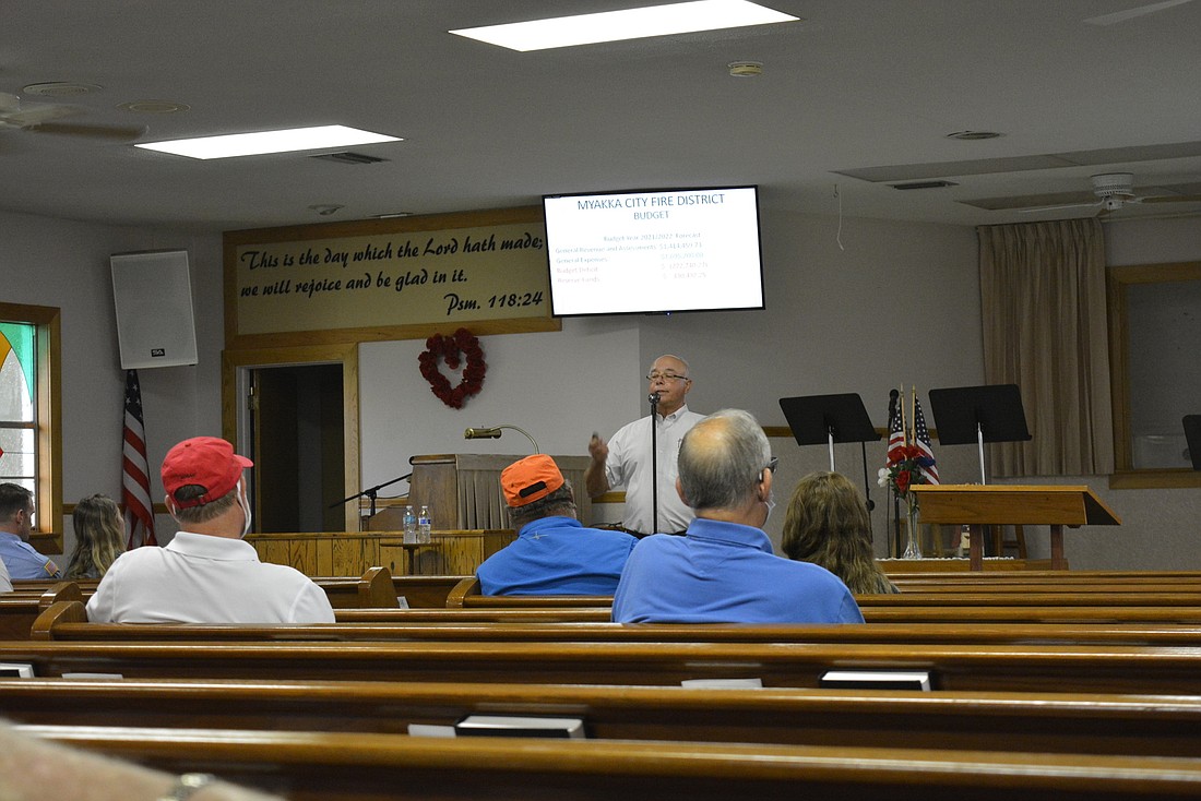 Myakka City Fire Control Chief Danny Cacchiotti took residents through budgetary needs and other questions related to the merger during a town hall meeting at Bethany Baptist Church July 16.