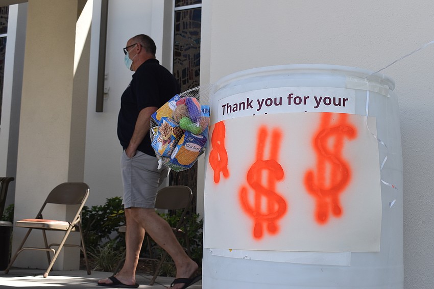 Pastor Ken Blyth staffs the outdoor drive.