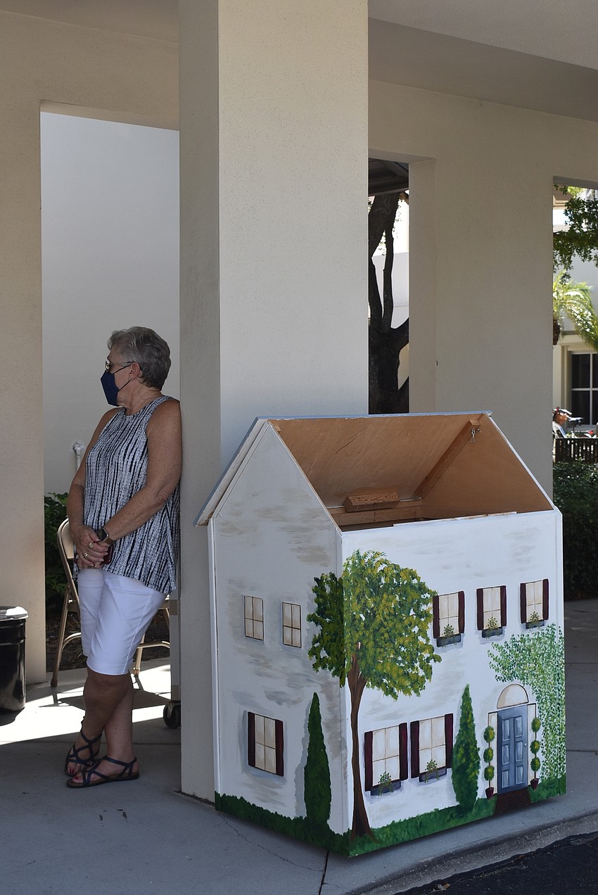 Drive-up donors could drop their donations in the house to avoid close contact with others.