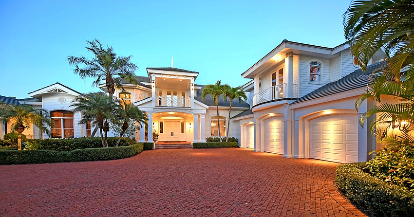 The home at 15 Lighthouse Point Drive is known as The White House.