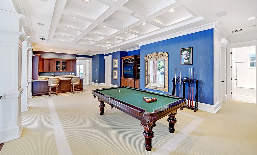 The game room features a wet bar.