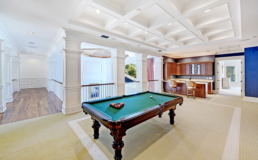 The game room features a wet bar.