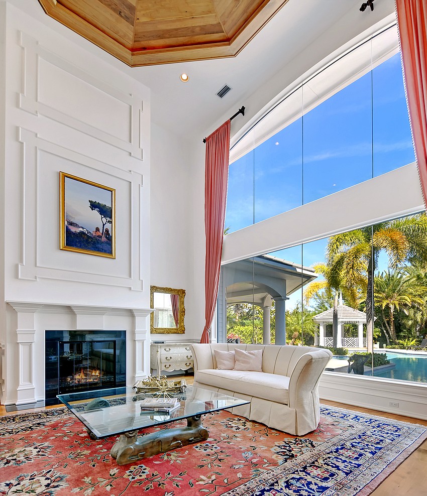 Floor to ceiling windows are among the homes' features.