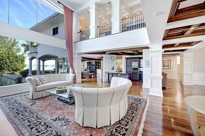 Floor to ceiling windows are among the homes' features.