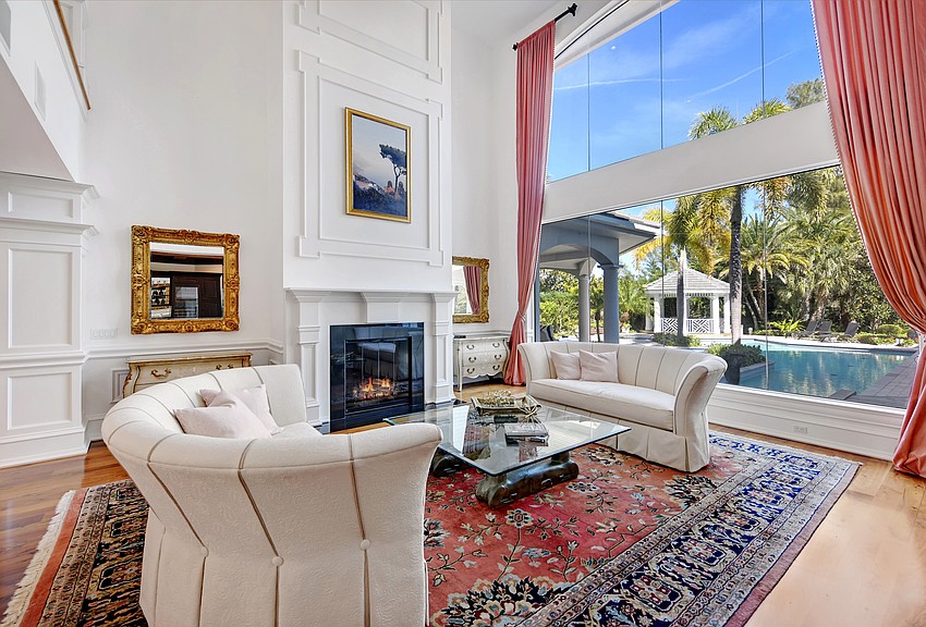 Floor to ceiling windows are among the homes' features.