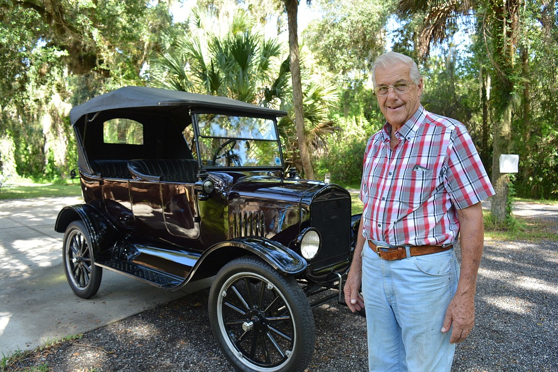 Jim Almeter loves his old cars. Photo by Pam Eubanks.