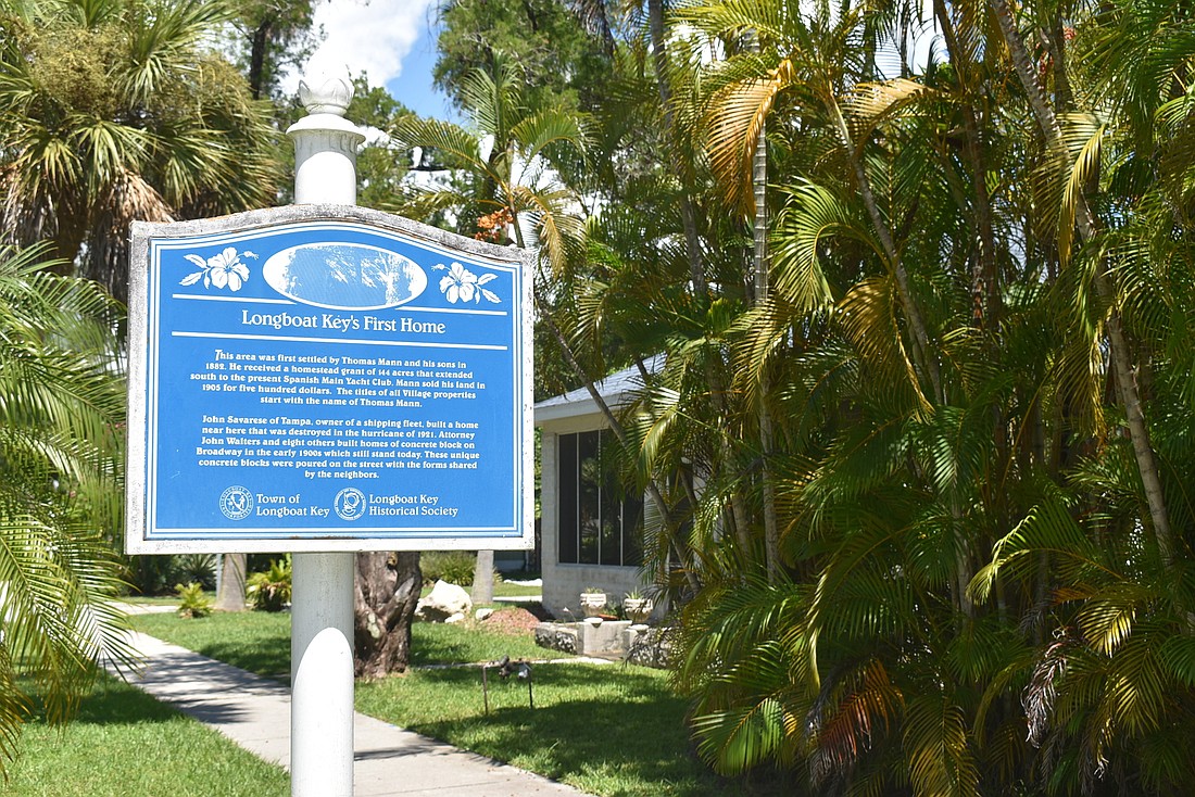 Stop and read the plaque that gives visitors a little more context to Longboat history.