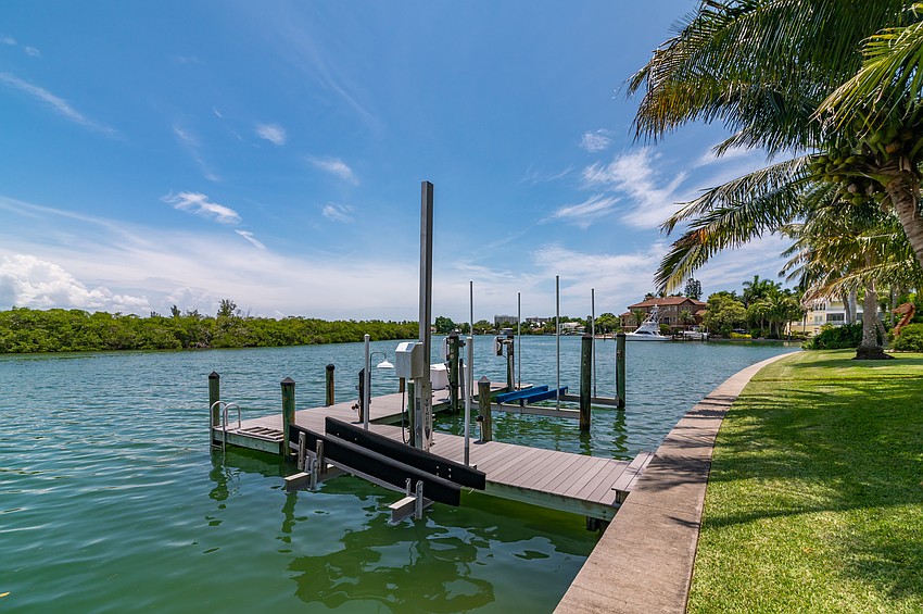 The house has pier access to Sarasota Bay.